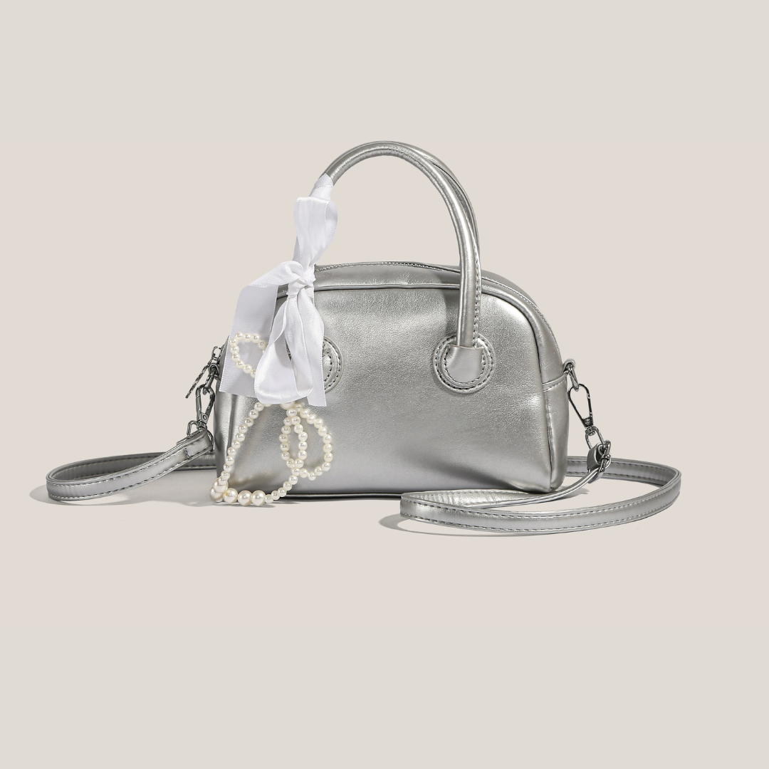 Bolso de mano metalizado Perla
