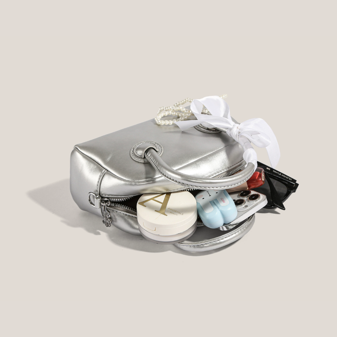 Bolso de mano metalizado Perla