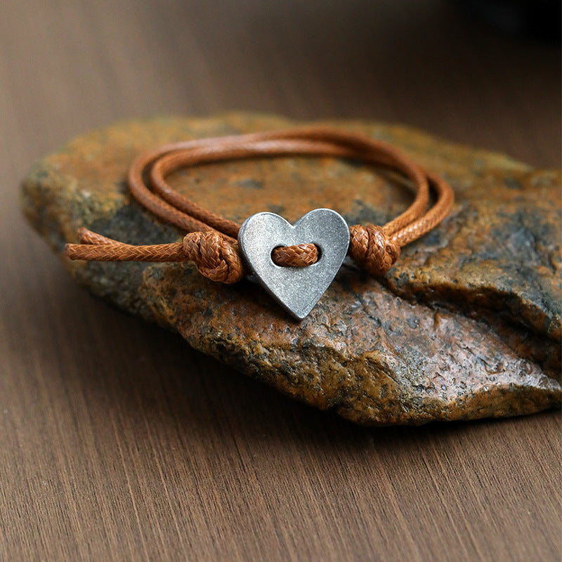 Amoura - Pulsera hecha a mano con símbolo del corazón