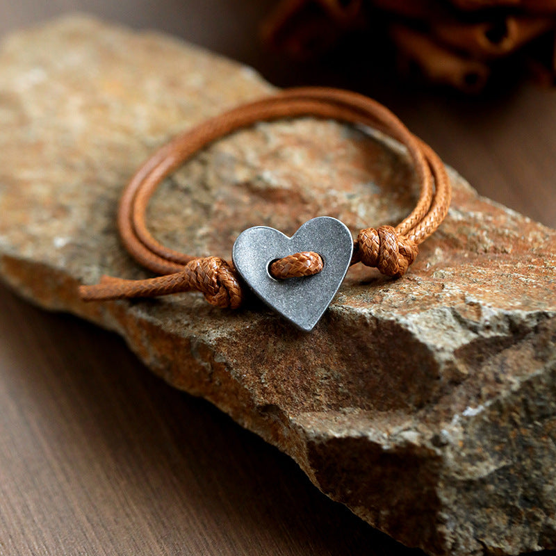 Amoura - Pulsera hecha a mano con símbolo del corazón