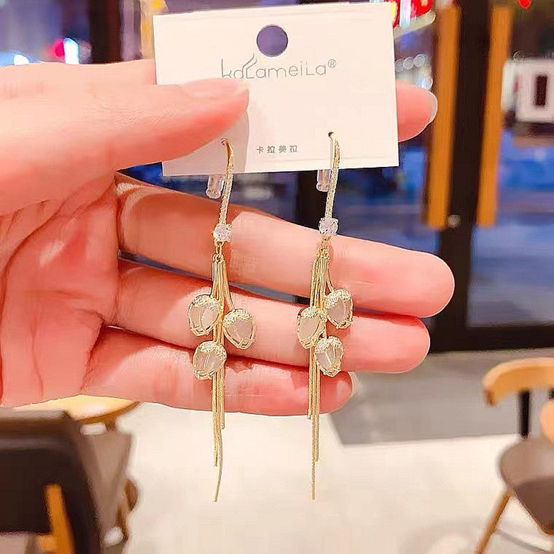 Clarisse – Pendientes en forma de flor con detalle luminoso