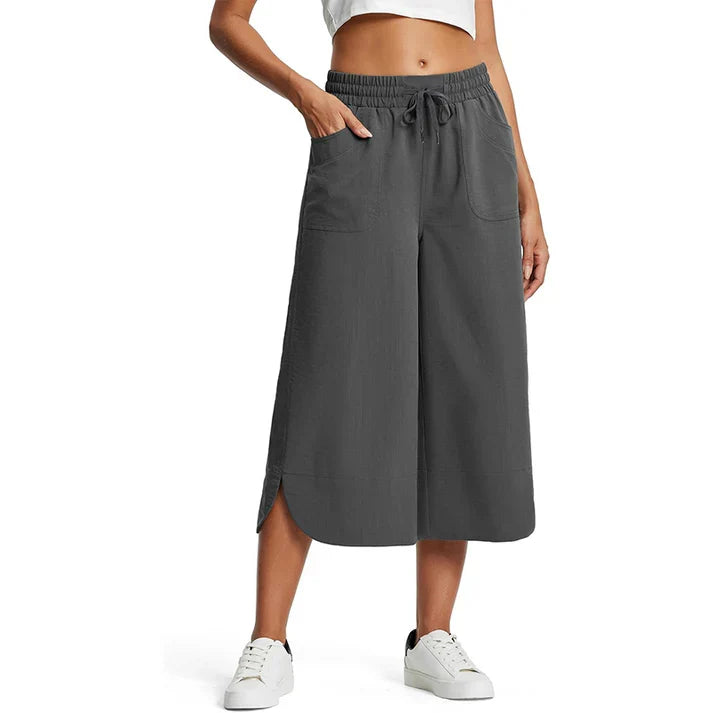 Aina - Pantalones cropped transpirables